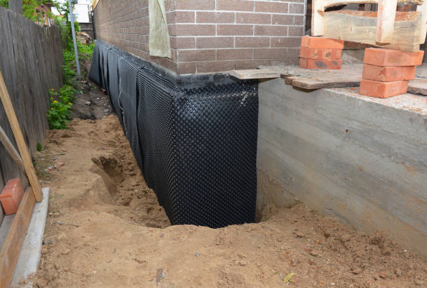 Happy homeowners after waterproofing job in Nashville